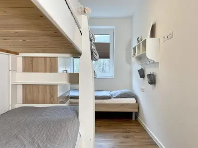 Ein Bett oder Betten in einem Zimmer der Unterkunft Quartier Hohe Geest 14