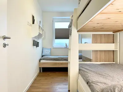 Ein Bett oder Betten in einem Zimmer der Unterkunft Quartier Hohe Geest 19