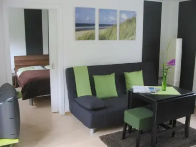 Ein Sitzbereich in der Unterkunft Ferienwohnung Strandzeit Cuxhaven
