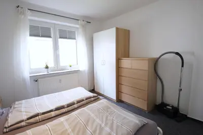 Ein Bett oder Betten in einem Zimmer der Unterkunft Appartementhaus Nige Ooge Ferienwohnung Nr. 3