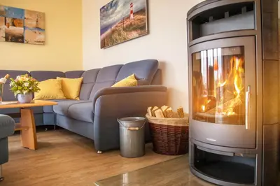Ein Sitzbereich in der Unterkunft Ferienhaus Strandnixe