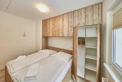 Ein Bett oder Betten in einem Zimmer der Unterkunft Haus Pamir - Fewo 20