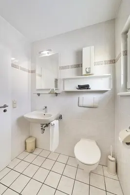Ein Badezimmer in der Unterkunft Haus Pamir - Fewo 24