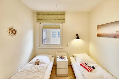 Ein Bett oder Betten in einem Zimmer der Unterkunft Haus Pamir - Fewo 25