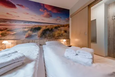 Ein Bett oder Betten in einem Zimmer der Unterkunft Haus Pamir - Fewo 28