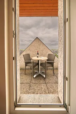 Ein Balkon oder eine Terrasse in der Unterkunft Haus Pamir - Fewo 29