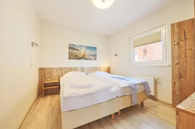Ein Bett oder Betten in einem Zimmer der Unterkunft Haus Pamir - Fewo 29