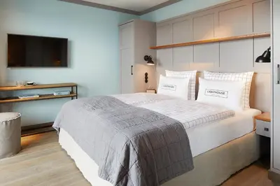 Ein Bett oder Betten in einem Zimmer der Unterkunft Lighthouse Hotel & Spa