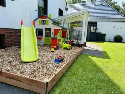 Ein Kinderspielbereich in der Unterkunft Gästehaus Bremer