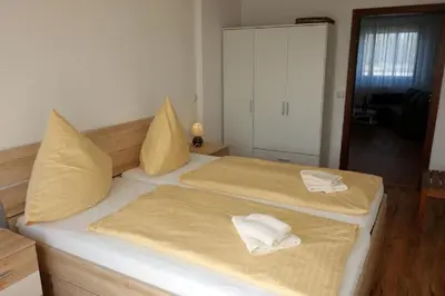 Ein Bett oder Betten in einem Zimmer der Unterkunft Herzmuschel