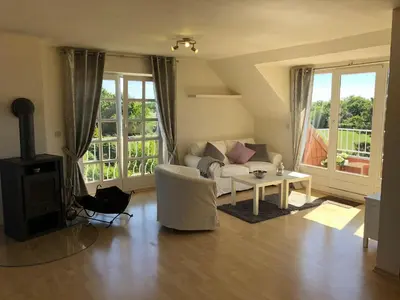 Ein Sitzbereich in der Unterkunft Ferienwohnung Op'n Rugenbarg 70