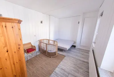 Ein Bett oder Betten in einem Zimmer der Unterkunft Lotsenkoje