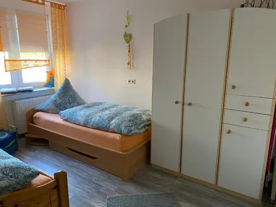 Ein Bett oder Betten in einem Zimmer der Unterkunft Ferienwohnung Meer&mehr
