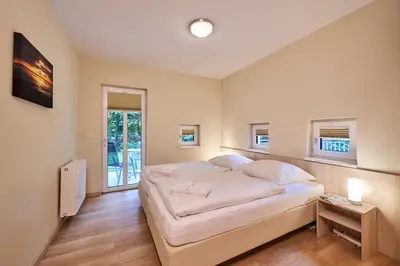 Ein Bett oder Betten in einem Zimmer der Unterkunft Haus Scharhörn-Riff - Fewo 15