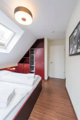 Ein Bett oder Betten in einem Zimmer der Unterkunft Haus Scharhörn-Riff - Fewo 18