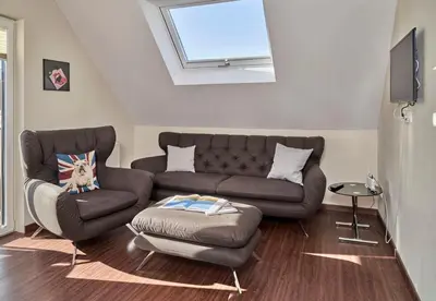 Ein Sitzbereich in der Unterkunft Haus Scharhörn-Riff - Fewo 18