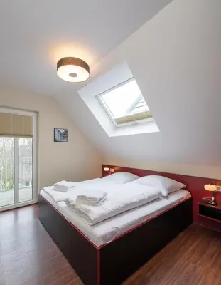 Ein Bett oder Betten in einem Zimmer der Unterkunft Haus Scharhörn-Riff - Fewo 18