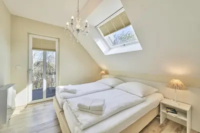 Ein Bett oder Betten in einem Zimmer der Unterkunft Haus Scharhörn-Riff - Fewo 19