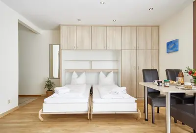Ein Bett oder Betten in einem Zimmer der Unterkunft Haus Seemuschel - Fewo 1