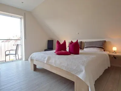 Ein Bett oder Betten in einem Zimmer der Unterkunft Appartement Strandstraße 10, Büsum