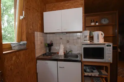 Küche/Küchenzeile in der Unterkunft kleines Appartment auf Gestütsanlage