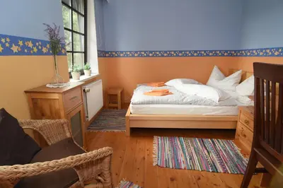 Ein Bett oder Betten in einem Zimmer der Unterkunft Ferienwohnung in herrlicher Waldrandlage