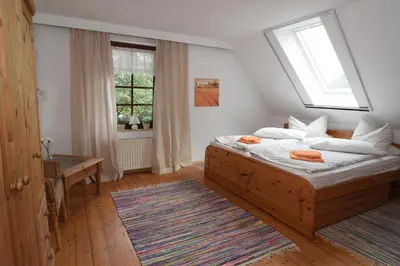 Ein Bett oder Betten in einem Zimmer der Unterkunft Ferienwohnung in herrlicher Waldrandlage