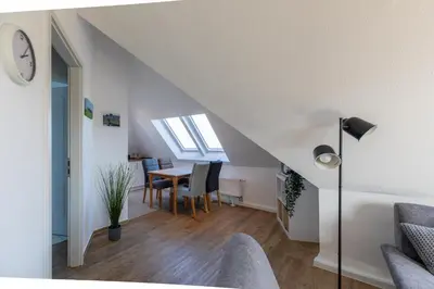 Ein Sitzbereich in der Unterkunft Am Seedeich 7, Wohnung 16
