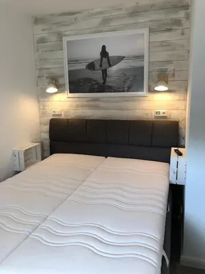 Ein Bett oder Betten in einem Zimmer der Unterkunft Seedeich