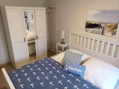 Ein Bett oder Betten in einem Zimmer der Unterkunft Elbstrom 09