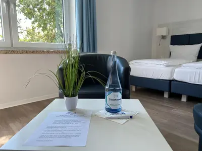 Ein Bett oder Betten in einem Zimmer der Unterkunft Gästehaus Blauth