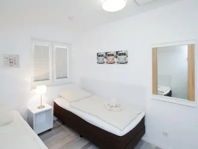 Ein Bett oder Betten in einem Zimmer der Unterkunft Haus Emil