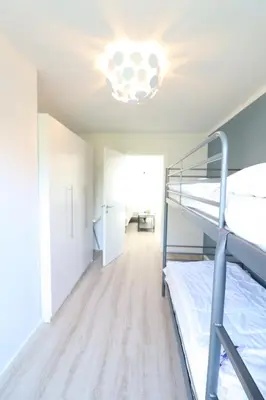Ein Bett oder Betten in einem Zimmer der Unterkunft Meerhaus