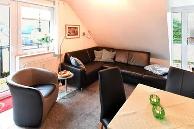 Ein Sitzbereich in der Unterkunft Haus Hamburg