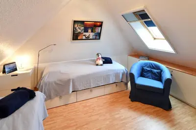 Ein Bett oder Betten in einem Zimmer der Unterkunft Haus Hamburg