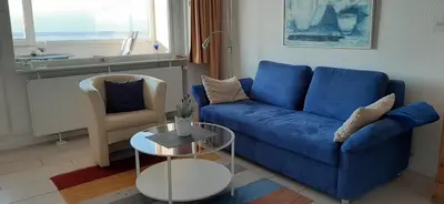 Ein Sitzbereich in der Unterkunft Sahlenburger Strand FeWo 27