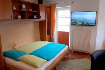 Ein Bett oder Betten in einem Zimmer der Unterkunft Haus Elbe 1 Wohnung 18