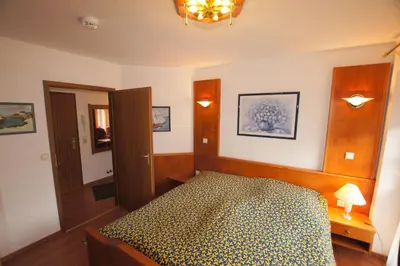 Ein Bett oder Betten in einem Zimmer der Unterkunft Haus Elbe 1 Wohnung 18