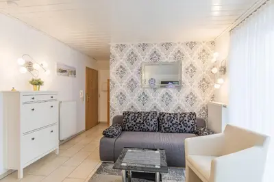 Ein Sitzbereich in der Unterkunft Haus Seewind Wohnung 2