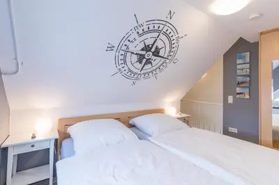 Ein Bett oder Betten in einem Zimmer der Unterkunft Haus Seewind Wohnung 2