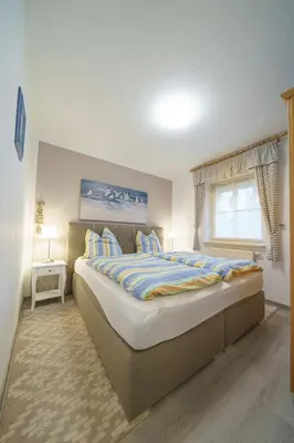 Ein Bett oder Betten in einem Zimmer der Unterkunft Ferienhaus Pepe
