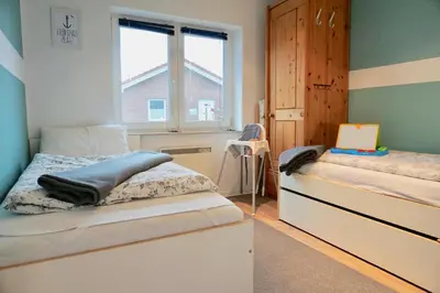 Ein Bett oder Betten in einem Zimmer der Unterkunft Ferienhaus Ryokan