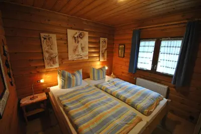 Ein Bett oder Betten in einem Zimmer der Unterkunft Ferienhaus Buddelschiff