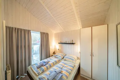 Ein Bett oder Betten in einem Zimmer der Unterkunft Ferienhaus Wyk auf Föhr