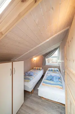 Ein Bett oder Betten in einem Zimmer der Unterkunft Ferienhaus Wellnessoase