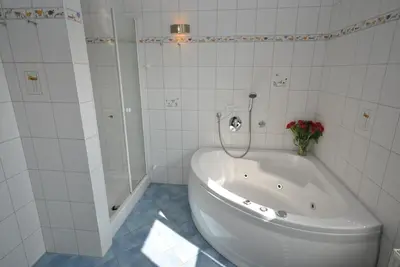 Ein Badezimmer in der Unterkunft Ferienhaus Wattwurm