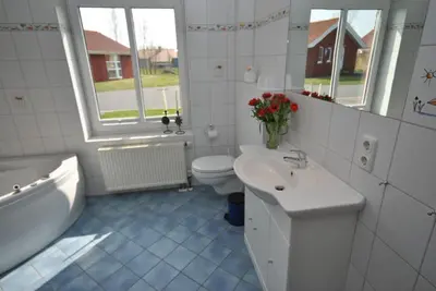 Ein Badezimmer in der Unterkunft Ferienhaus Wattwurm