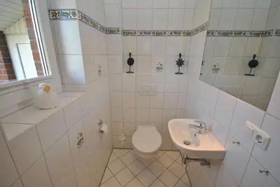 Ein Badezimmer in der Unterkunft Ferienhaus Wattwurm