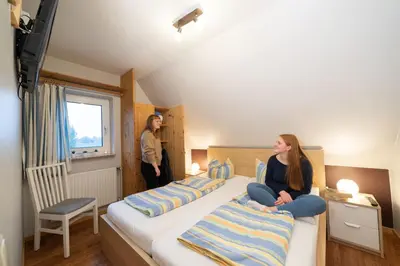 Ein Bett oder Betten in einem Zimmer der Unterkunft Ferienwohnung Kiebitz III