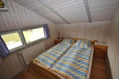 Ein Bett oder Betten in einem Zimmer der Unterkunft Ferienhaus Korsör